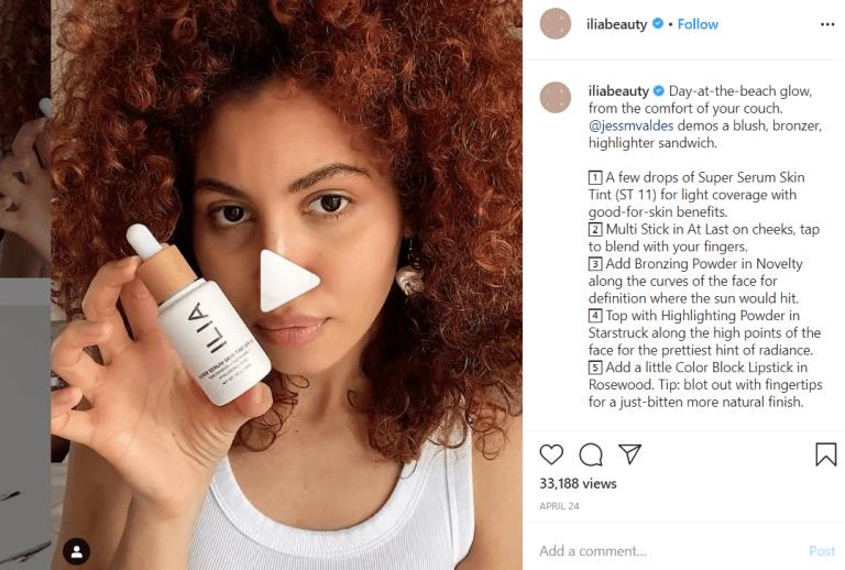 influencer holding makeup product